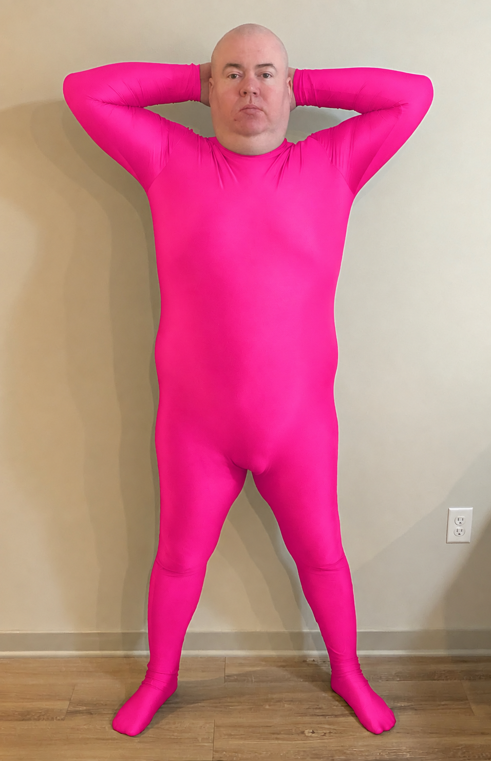 Micheal Ray Berry in the designated pink correction uniform, Inspection position, hands behind head.
