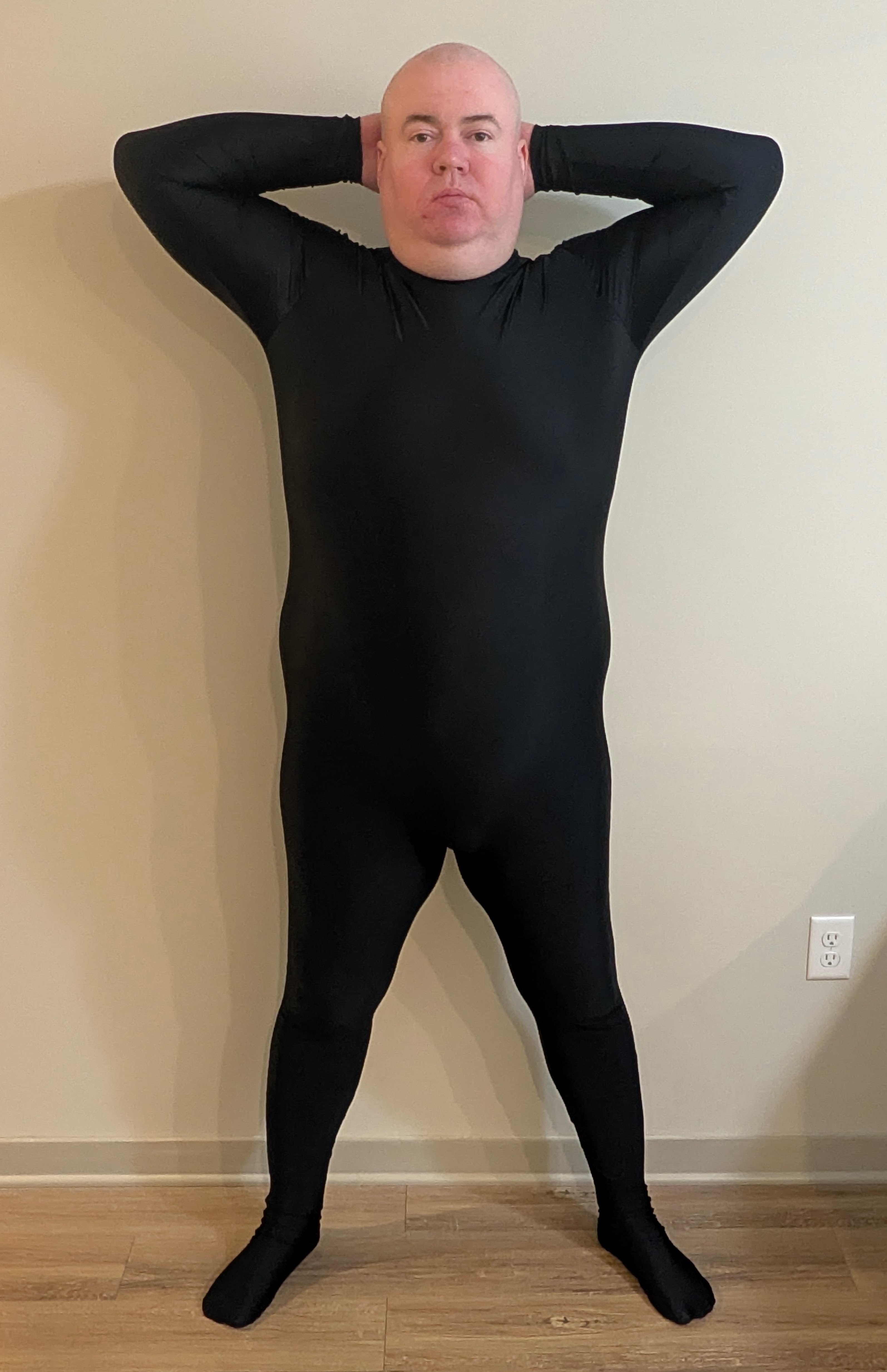 Micheal Ray Berry, official photograph — black unitard, steel or titanium collar, hands behind head. Declared start 340.